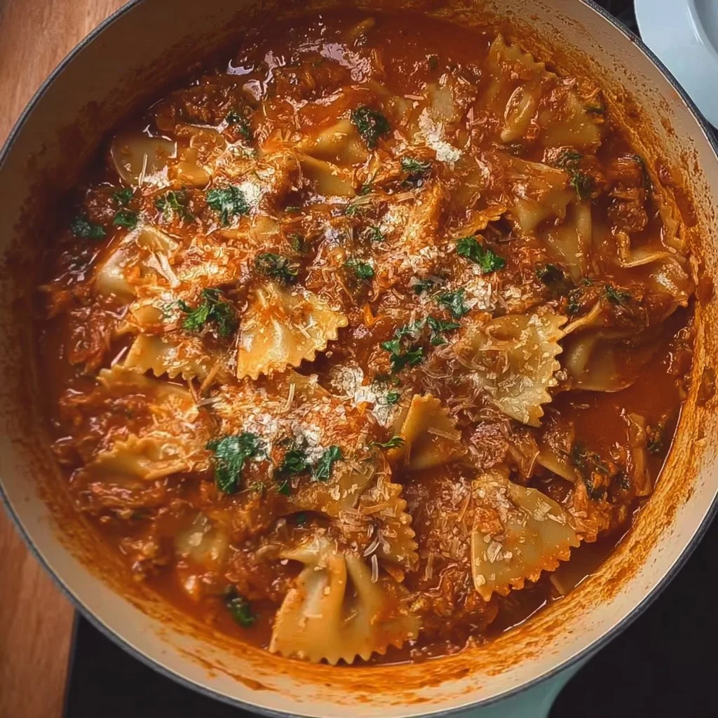 Bowl of viral Lasagna Soup topped with cheese and herbs