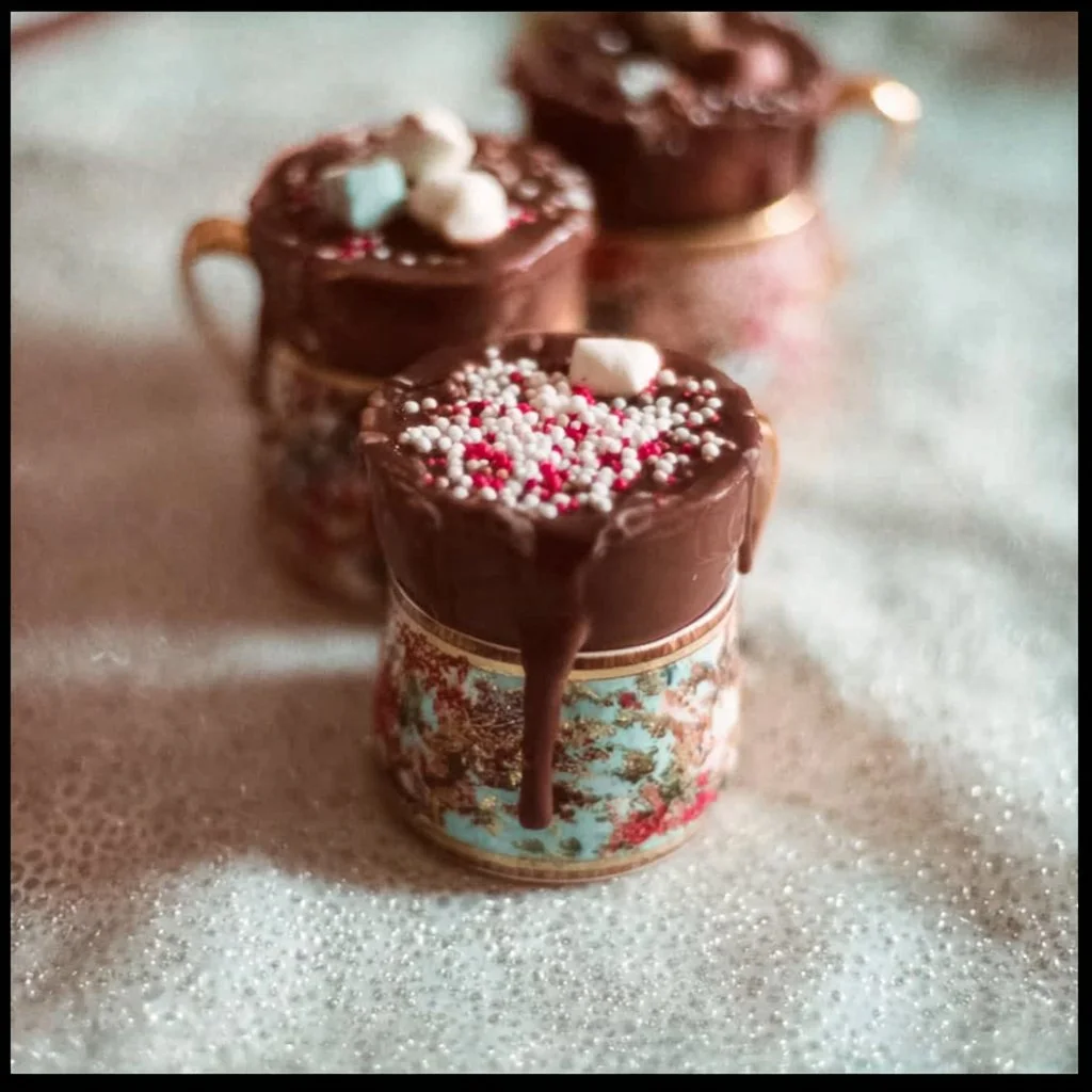 Delicious chocolate hot cups with whipped cream and chocolate shavings