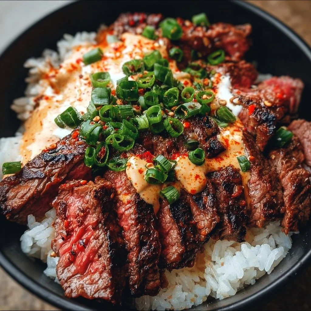Savory Korean BBQ Steak Rice Bowl with vegetables and sauce