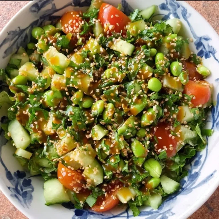 High protein salad with Asian dressing, vibrant veggies, and protein-rich ingredients.